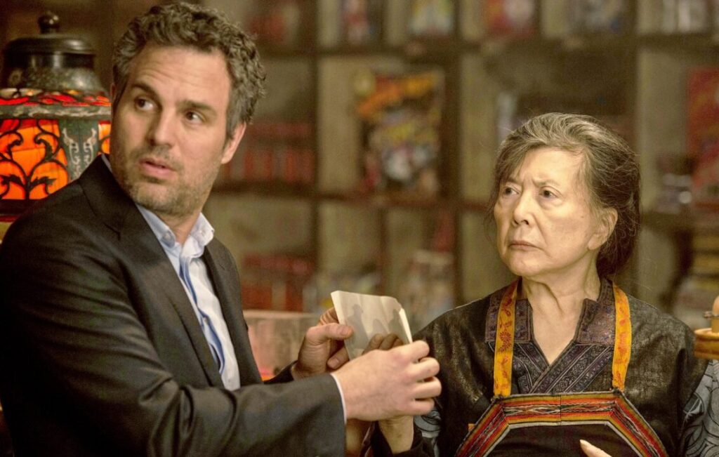 Dylan Rhodes (Mark Ruffalo) in a magic shop in Macau, speaking with an older woman, from Now You See Me 2.