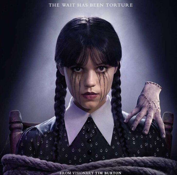 Wednesday Addams (Jenna Ortega) on the official Season 2 poster, tied with Thing on her shoulder, looking unimpressed.