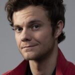 A headshot of Jack Quaid.
