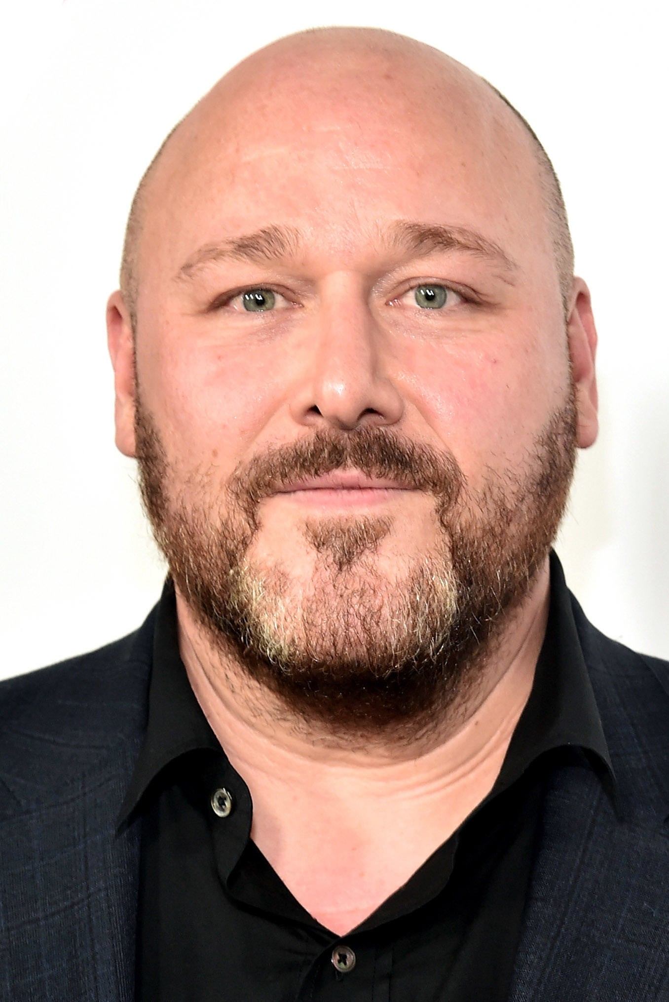 A headshot of Will Sasso.
