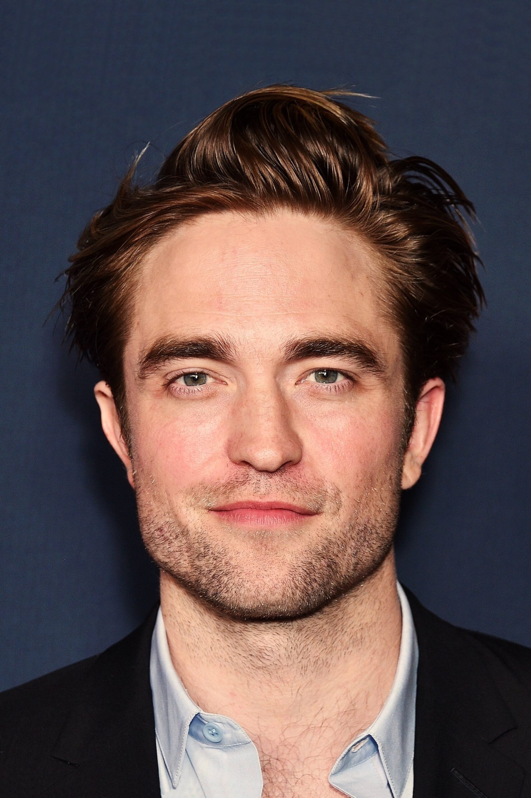 A headshot of Robert Pattinson.