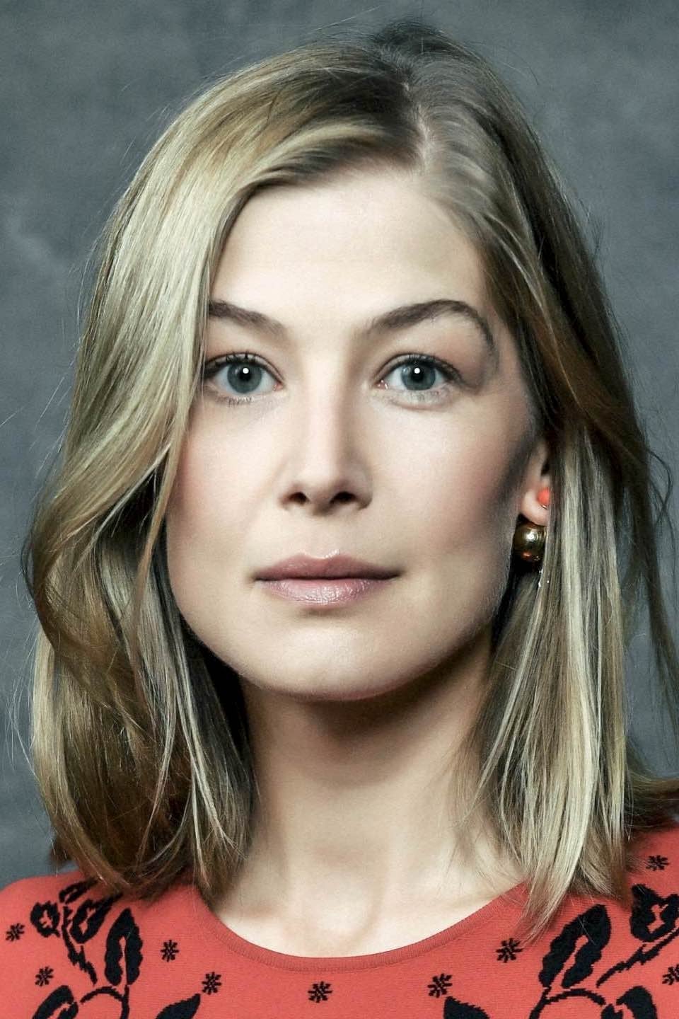 A headshot of Rosamund Pike.