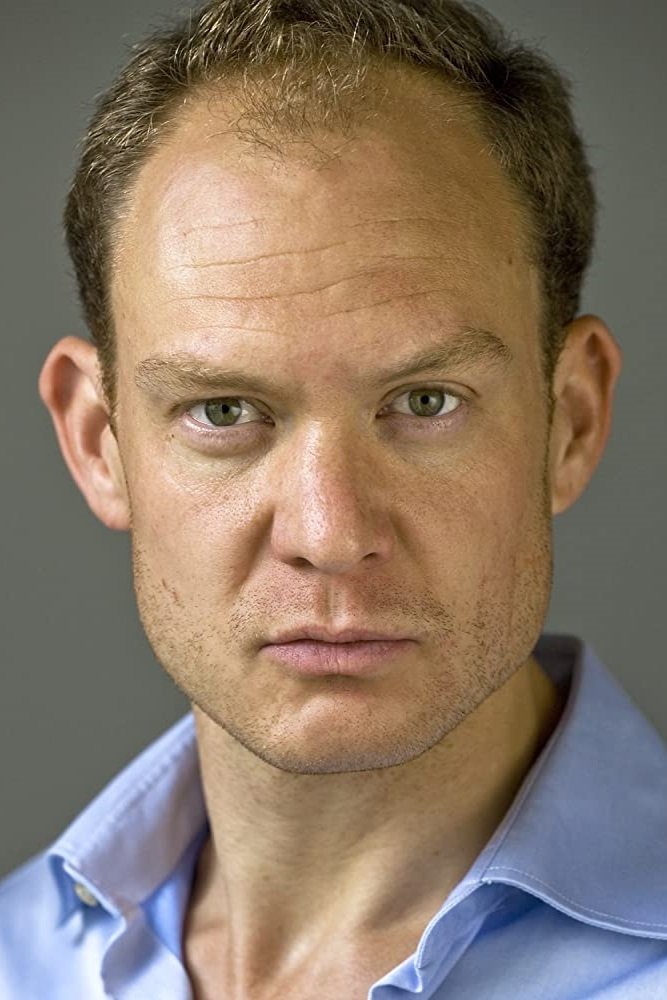 A headshot of James Richard Marshall.