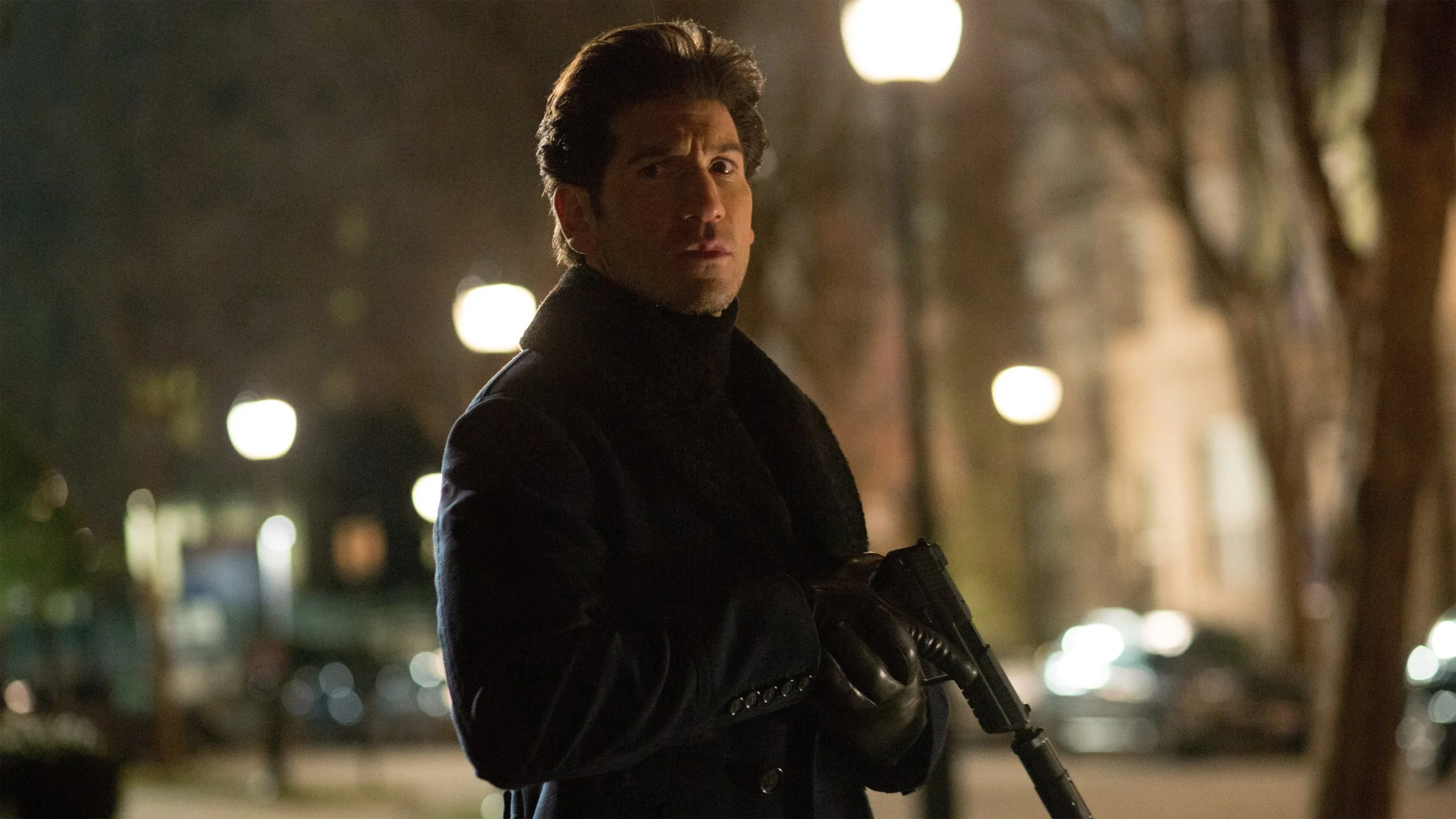 Movie still from The Accountant (2016). Brax (Jon Bernthal) with a fierce expression, indicating his readiness for action in The Accountant.