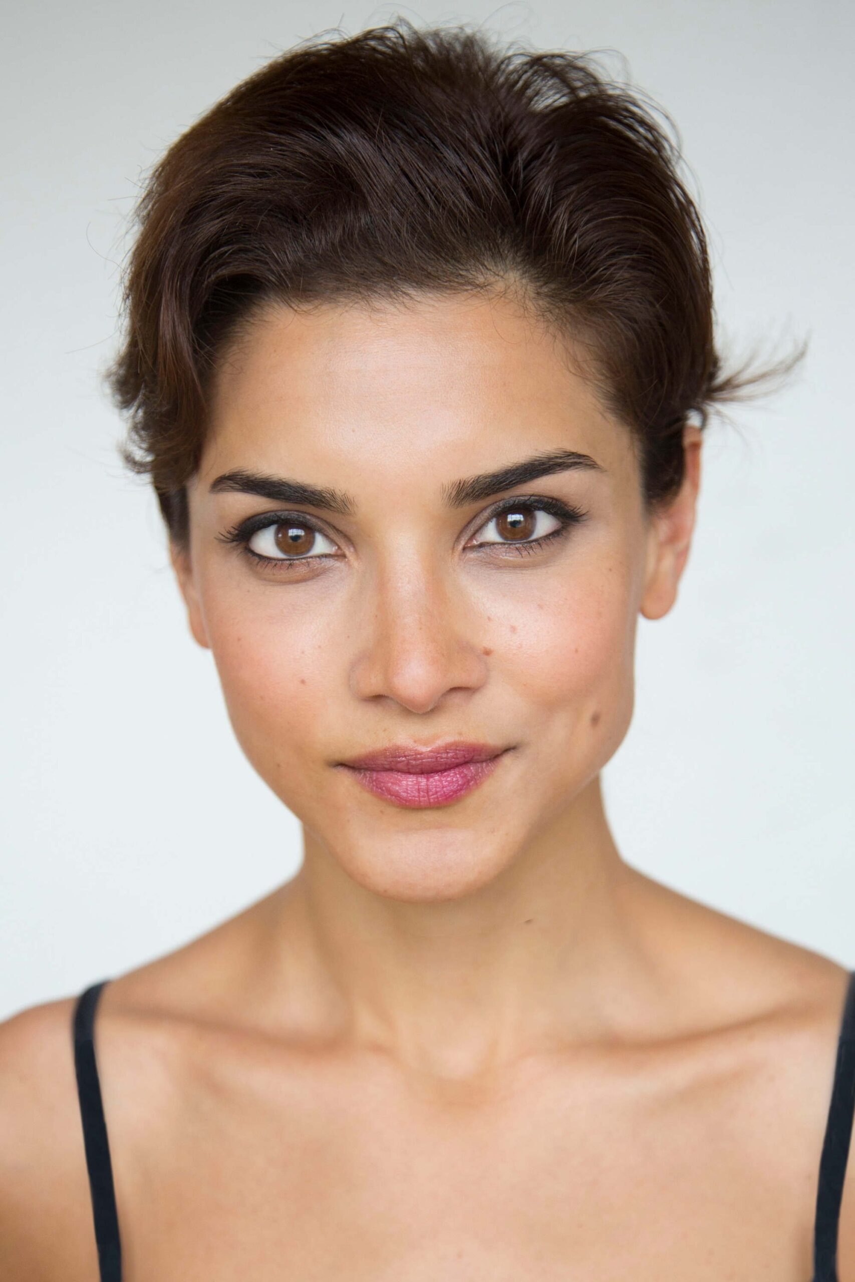 A headshot of Amber Rose Revah.