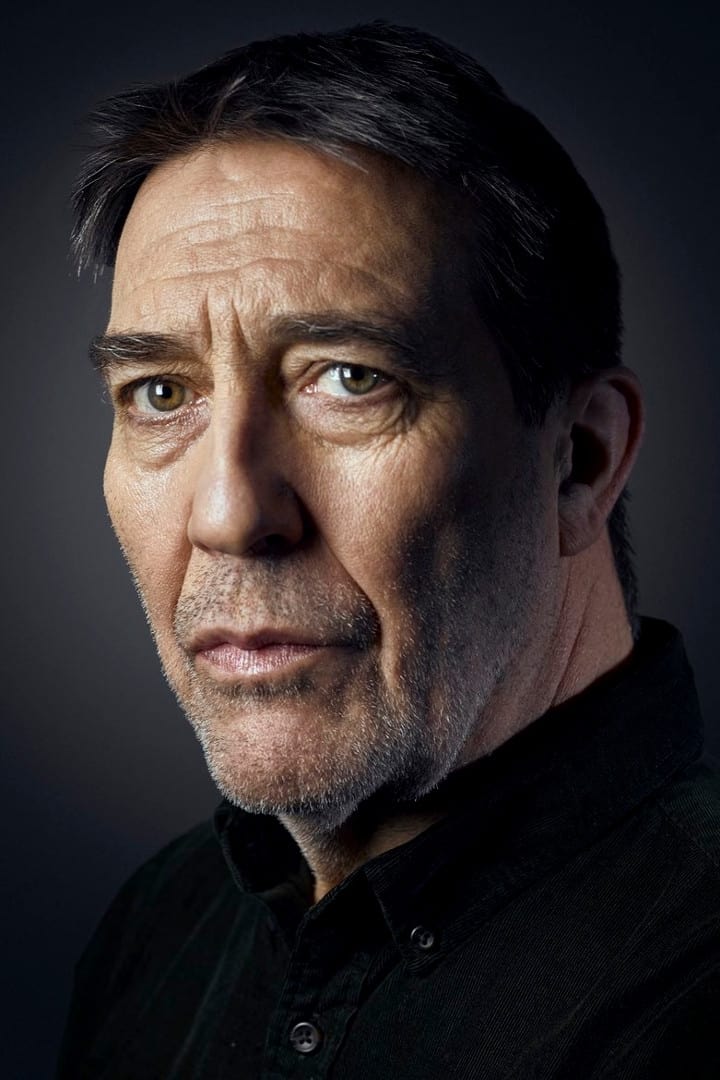 A headshot of Ciarán Hinds.