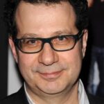 A headshot of Adam Brooks.