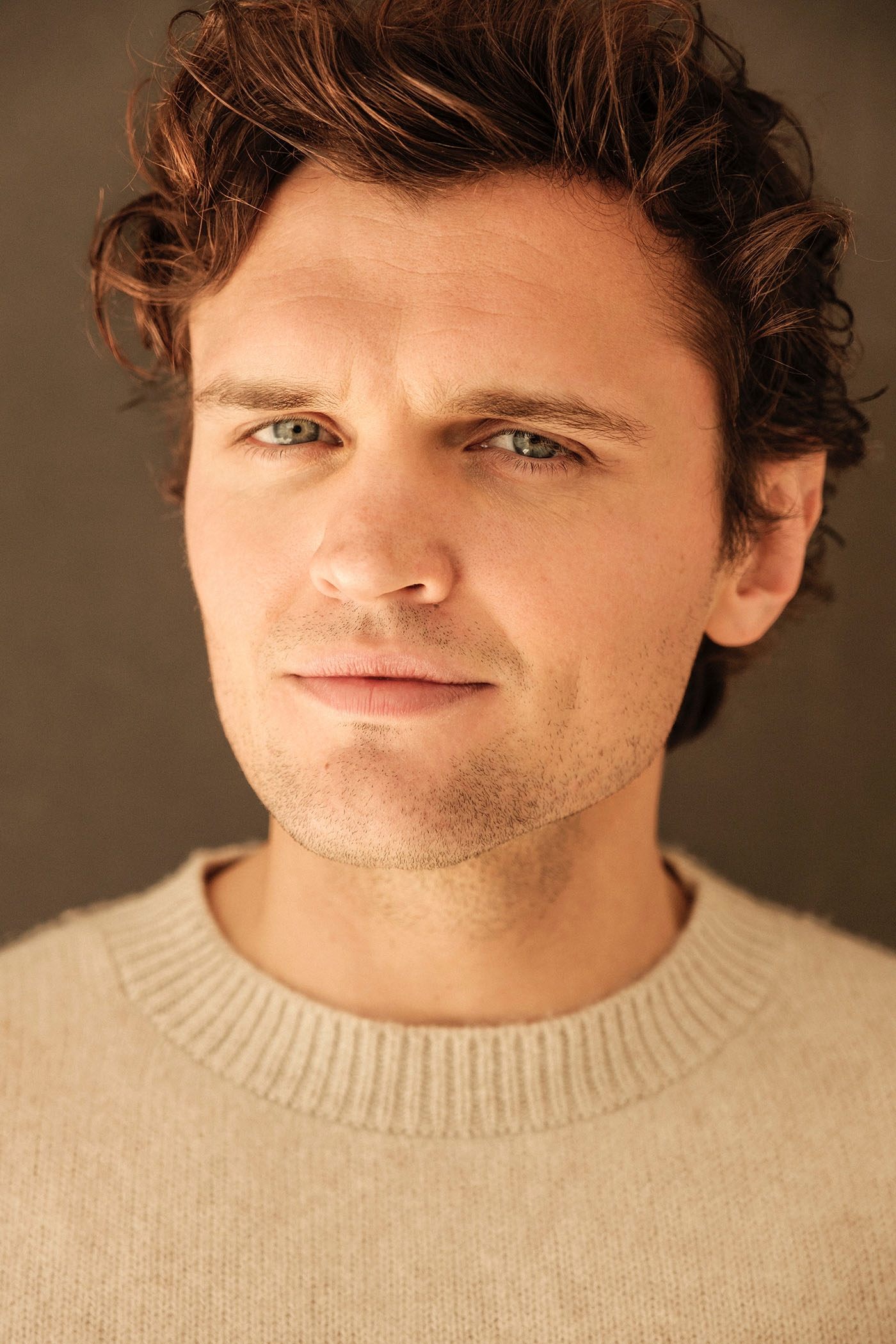 A headshot of Ray Nicholson.