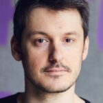 A headshot of Ilya Naishuller.