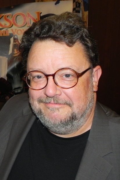 A headshot of Roger L. Jackson.