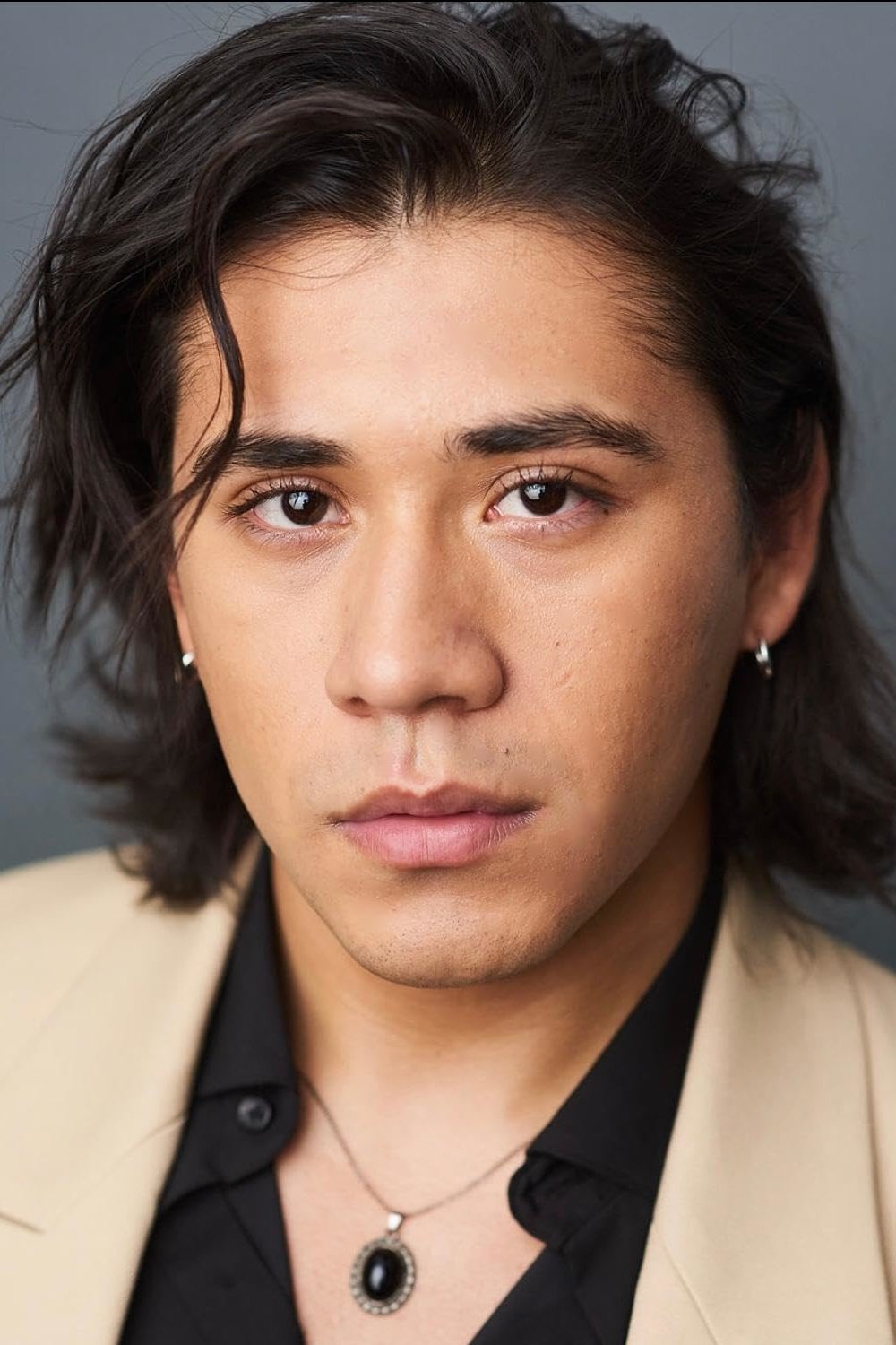 A headshot of Abner Lozano.