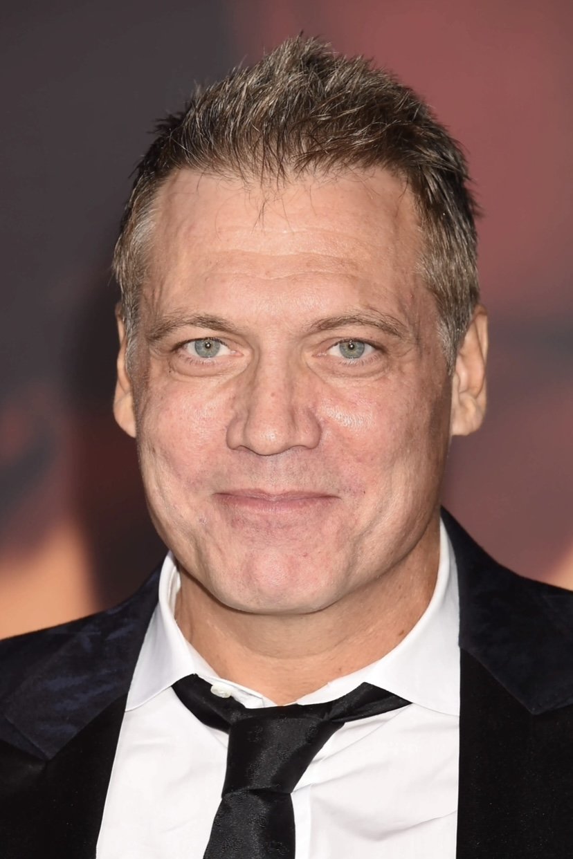 A headshot of Holt McCallany.
