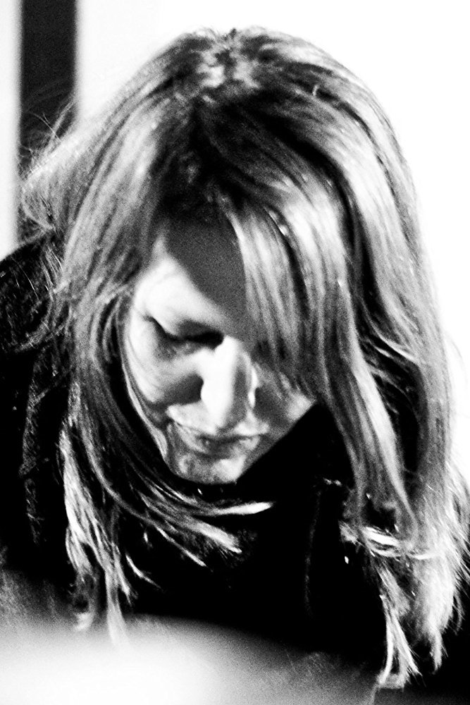 A headshot of Louise Ford.