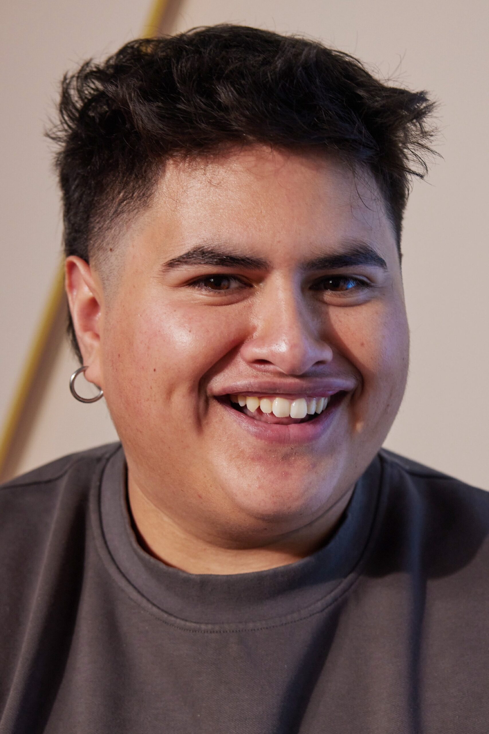 A headshot of Julian Dennison.