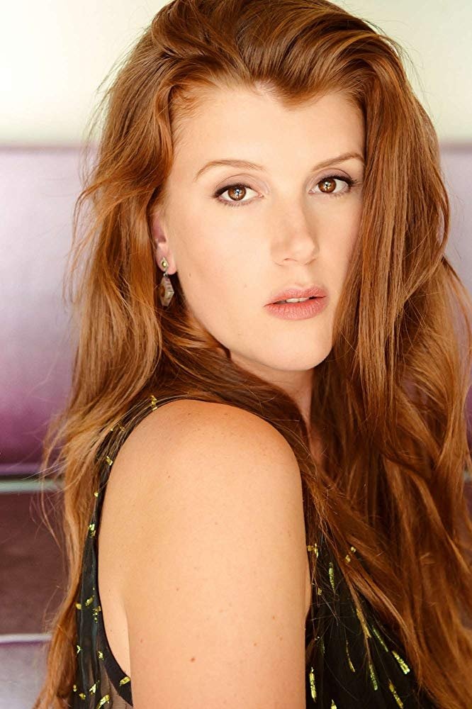 A headshot of Andrea Ware.