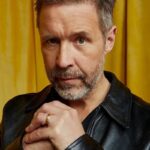 A headshot of Paddy Considine.