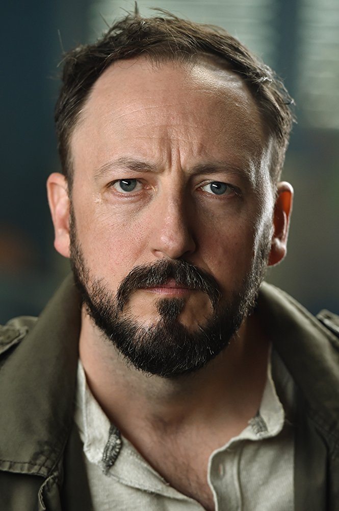 A headshot of Scott Poythress.