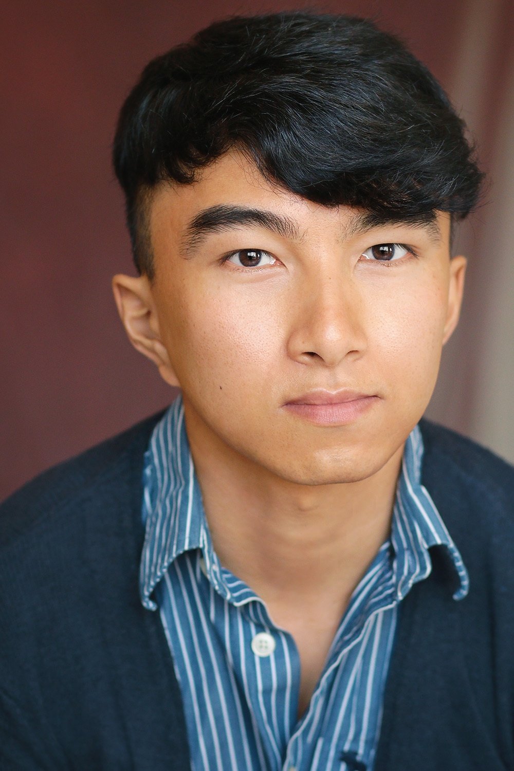 A headshot of Nhut Le.
