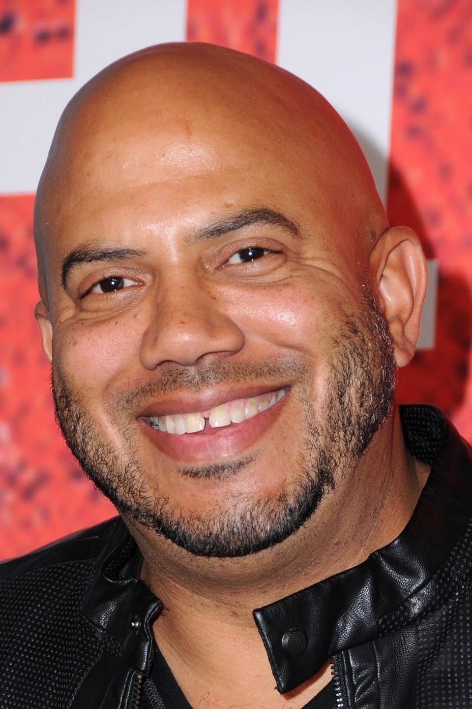 A headshot of Darren Grant.