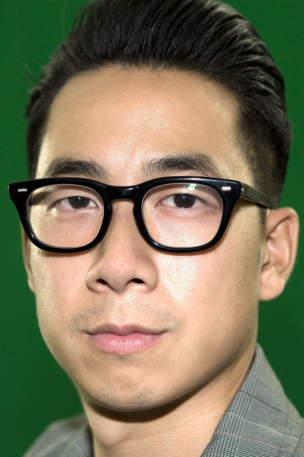 A headshot of Wayne Che Yip.